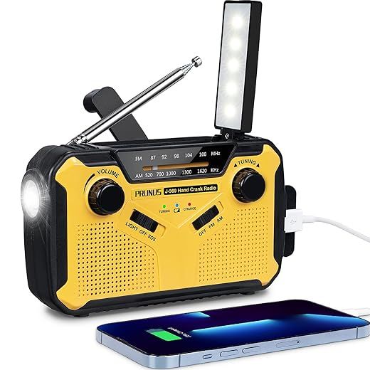 PRUNUS J-369 Radio Solar y a Pilas, Radios Emergencia con Manivela, Am FM Radio Portatil Pequeña Recargable con Banco de Energía de 3000 mAh, Lámpara Lectura, Linterna, SOS.