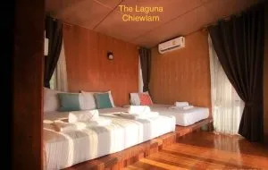 View of a room room at The Laguna Cheow Lan, floating bungalows on the Rajjaprabha Dam lake.
