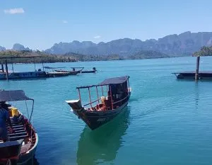 Boats in the Cheow Lan Lake, Khao Sok National Park.