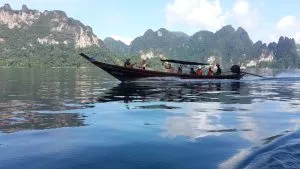 Cheow Lan Lake Khao Sok boat carrying tourists.