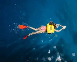 Girl snorkeling.