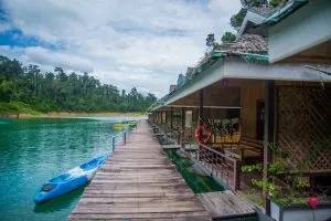 Kayak moored In front of the floating bungalows in the Cheow Lan Lake, Khao Sok National Park.