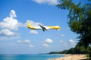 Scoot aircraft landing at Phuket Airport.