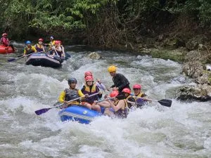 Tourists rafting at Ton Pariwat Waterfall in Phang Nga.