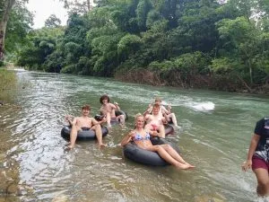 Tourists tubing on tires on the Sok River in Khao Sok.