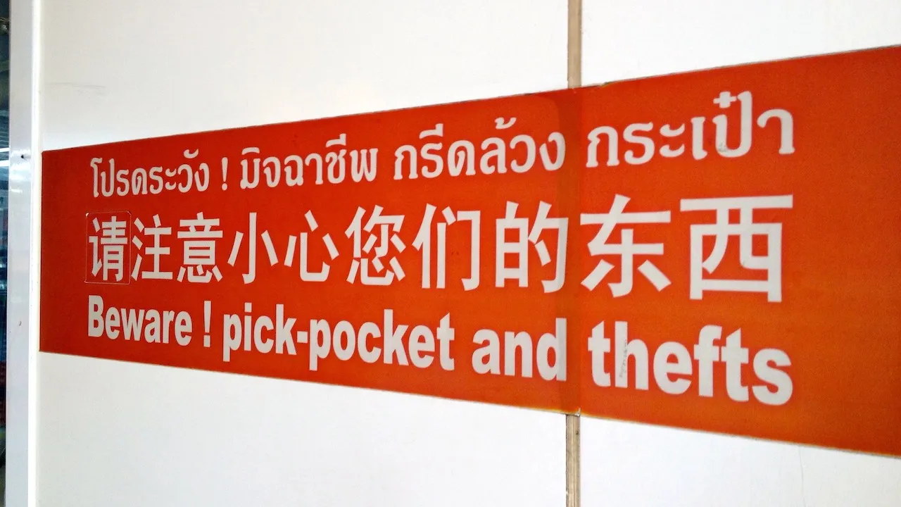 Beware! pick-pocket and thefts sign at Indra Square, Bangkok.