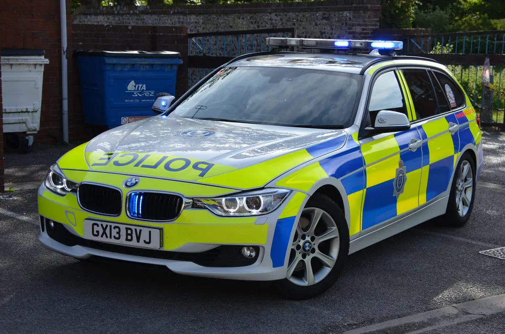 British Police BMW 330d car in Sussex, England, UK.