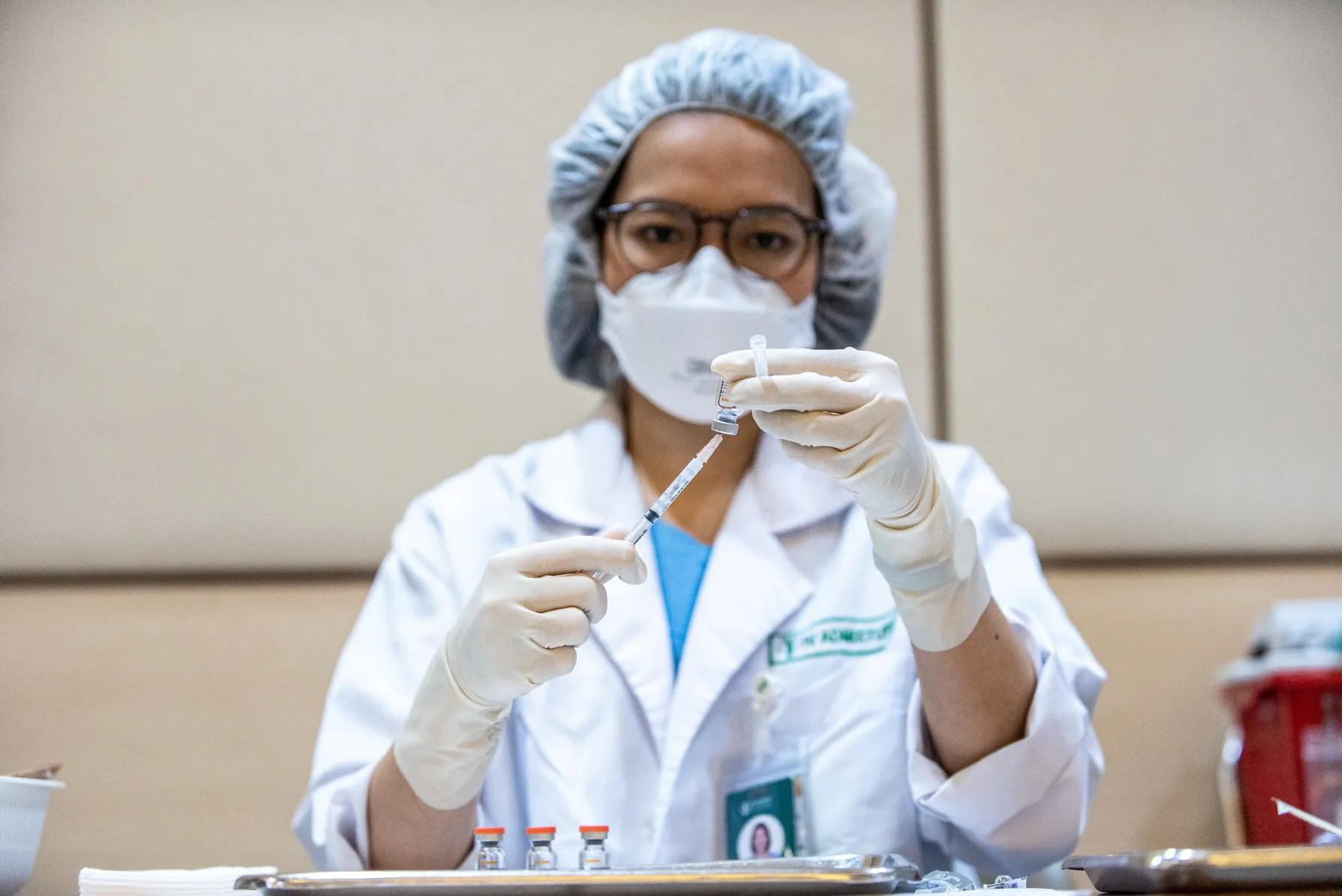 Nurse preparing a COVID-19 vaccine jab at Bumrungrad International Hospital