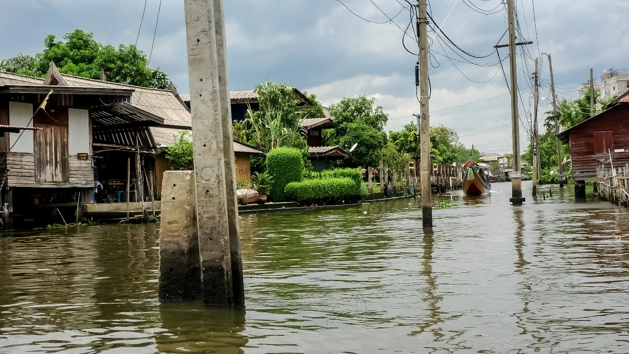 Boat sailing on a canal in Thailand