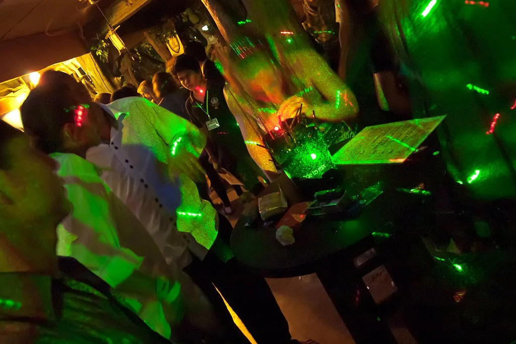 People dancing at a party on the outskirts of Chiang Mai.