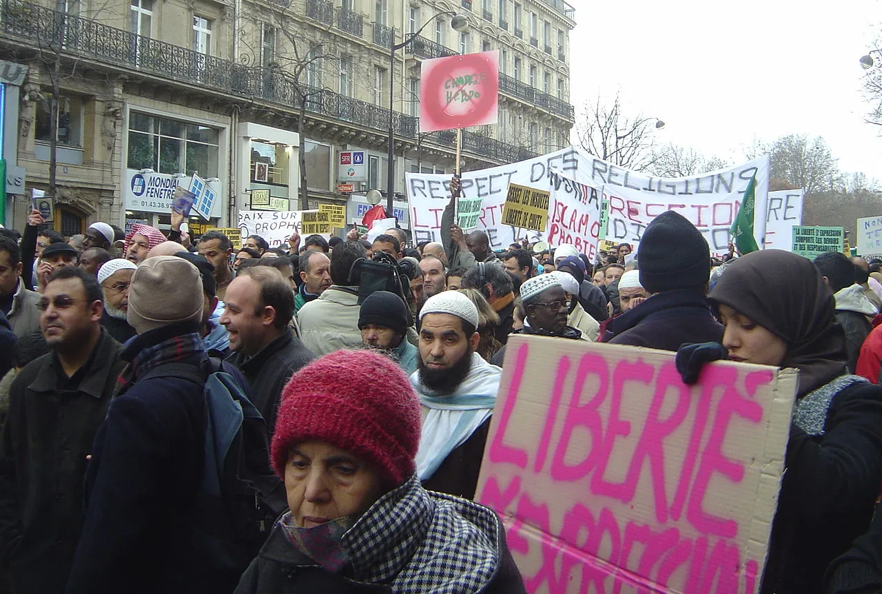 Muslims and leftists protest in Paris against the publication of caricatures of Muhammad