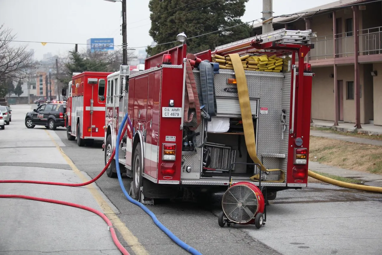 Fire truck and firefighters at Yongsan Fire Department in South Korea.