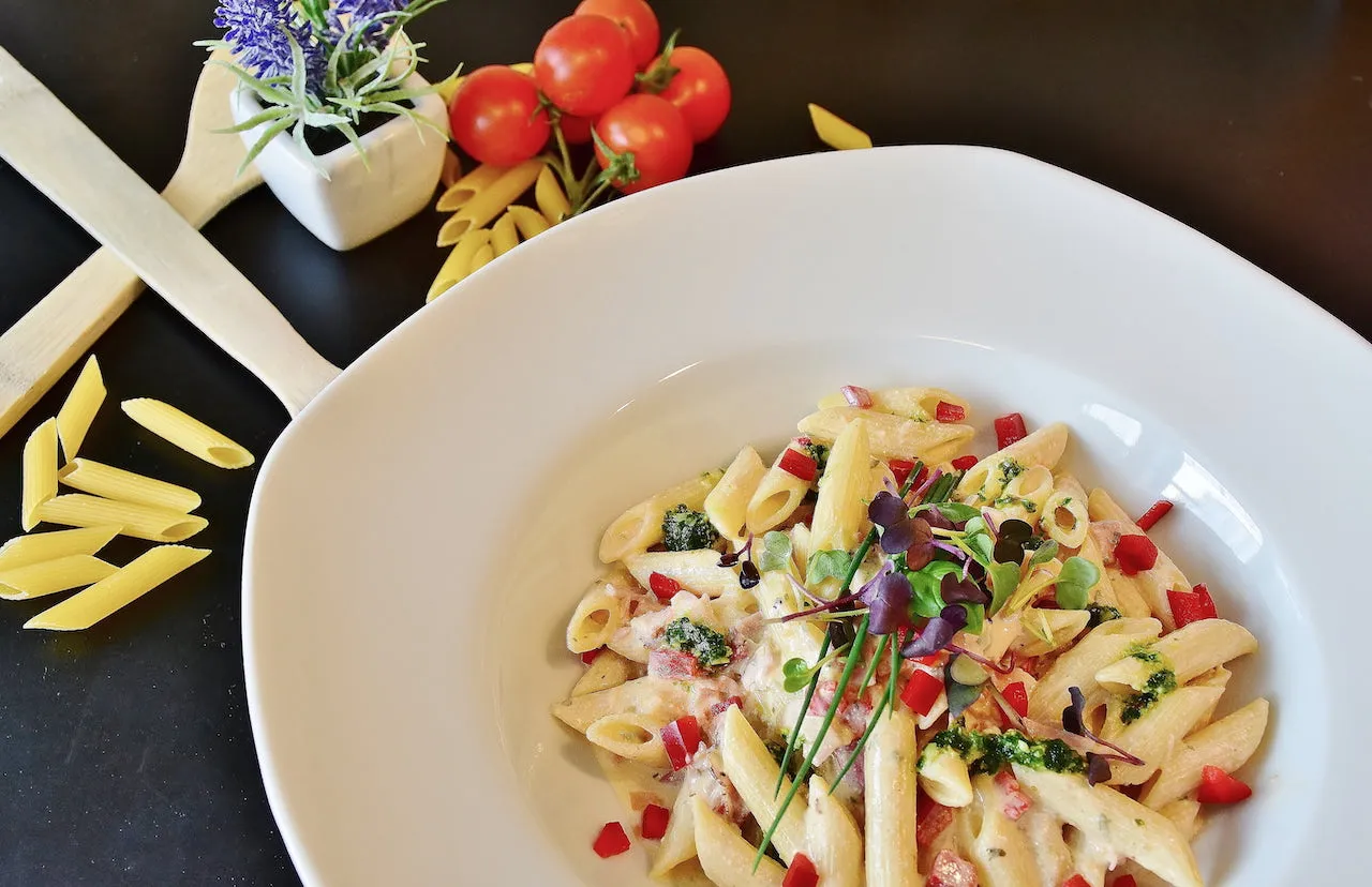 Fusilli pasta on white plate.