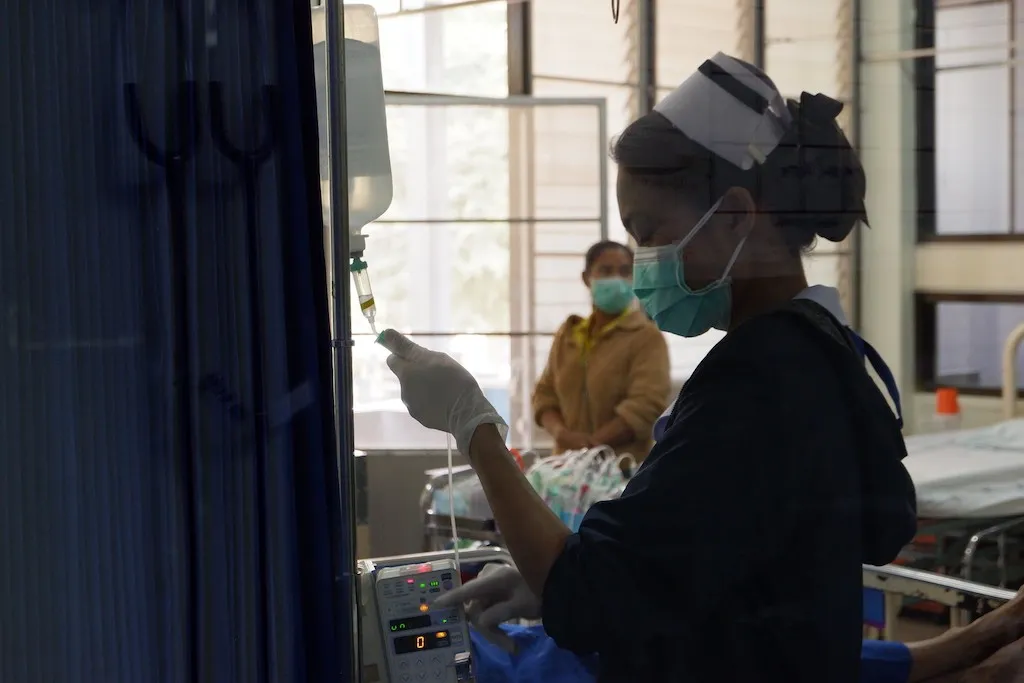 Thailand's universal healthcare system. Nurse monitoring a suspected COVID-19 coronavirus patient at Non Sung District Hospital in Nakhon Ratchasima (Korat)