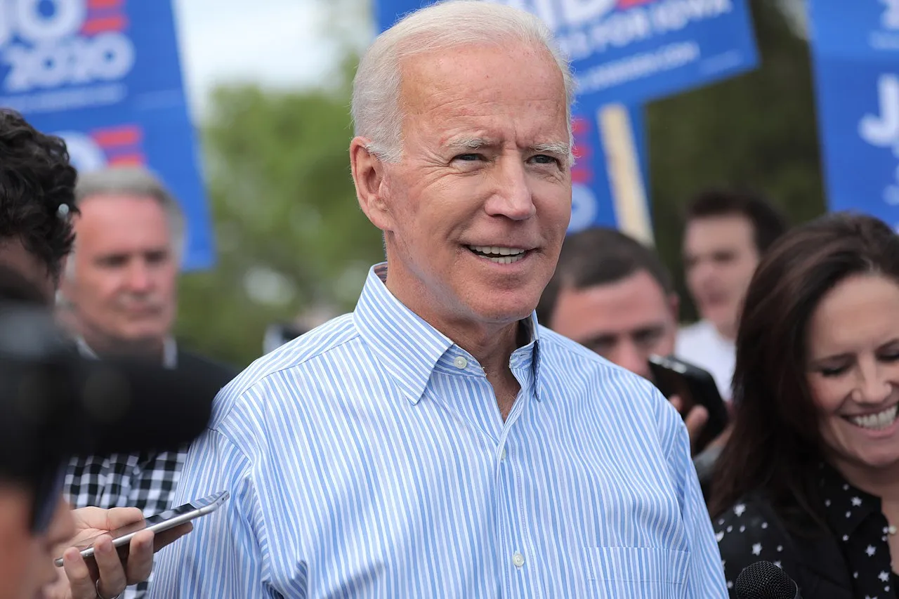 Joe Biden walking with supporters at a pre-Wing Ding march from Molly McGowan Park in Clear Lake, Iowa