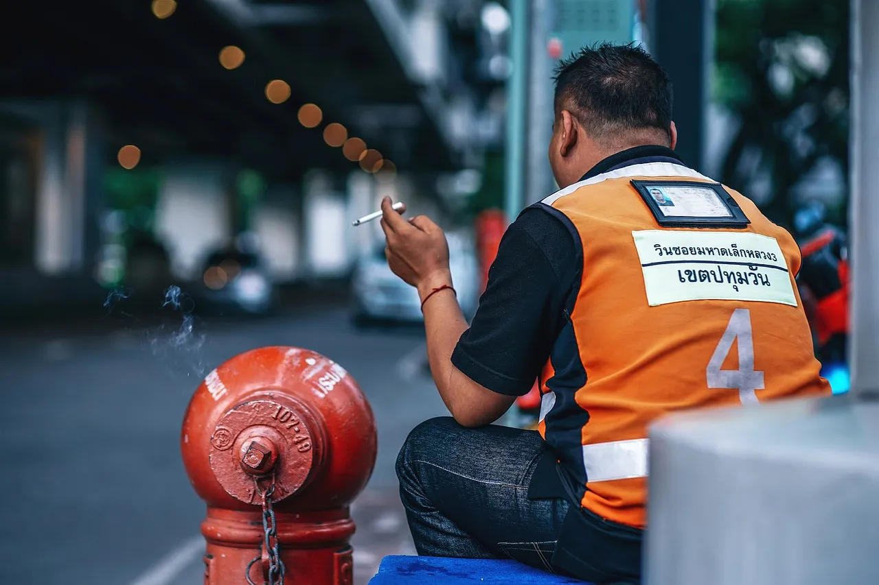 Motorcycle taxi driver in Bangkok.
