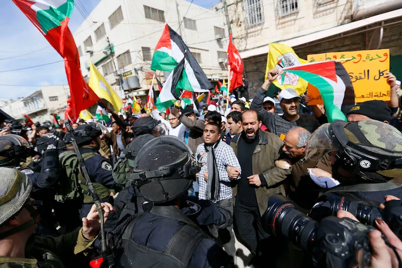 Palestinians demonstrate in the 20th anniversary of the Massacre of Hebron