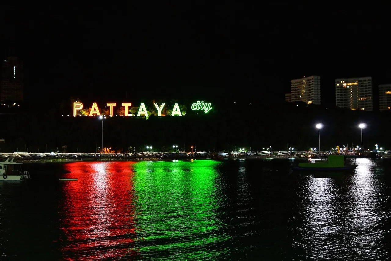 Pattaya city sign at Bali Hai pier at night.
