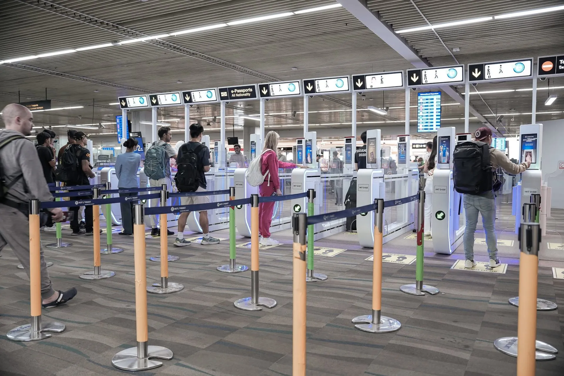 Tourists using the automatic passport control service (Automated Gates) at Phuket-Airport.
