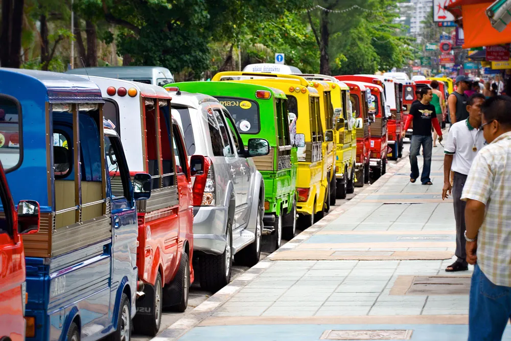 Row of Tuk-Tuks on Thawiwong Road in Patong Beach, Phuket
