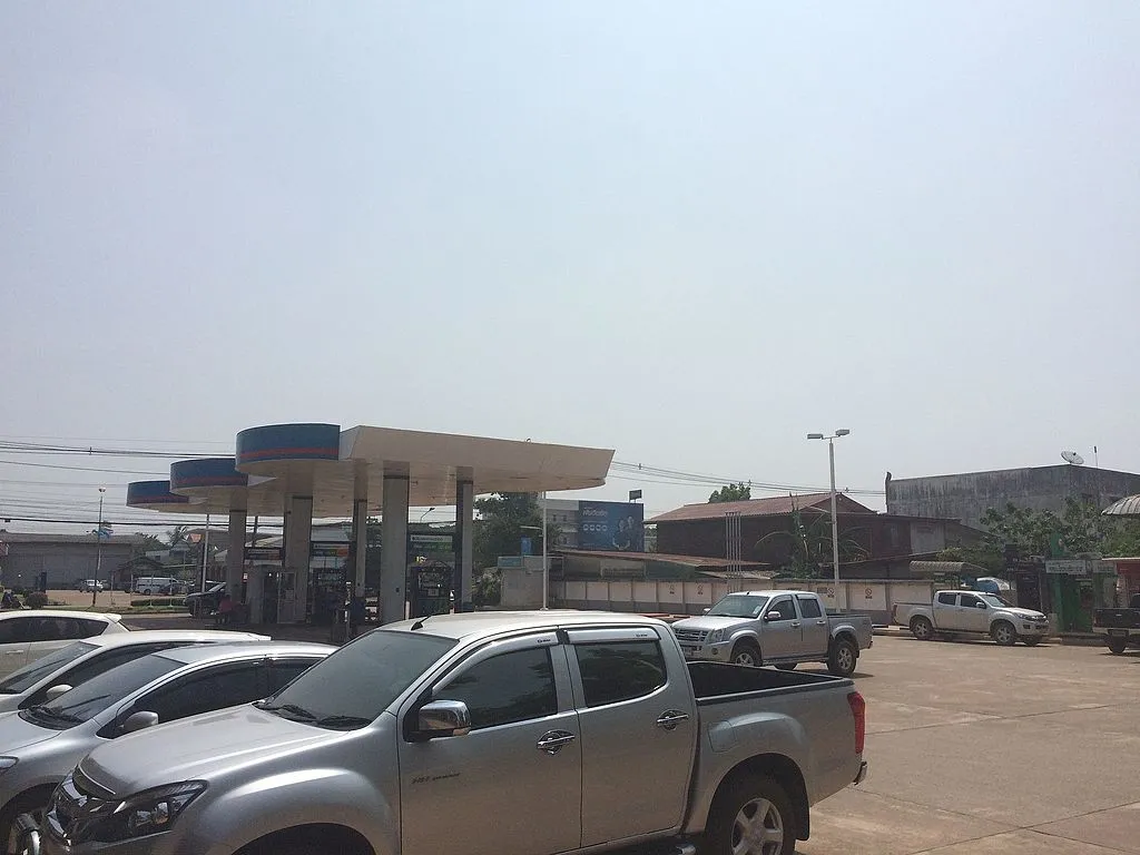 Pickup trucks at gas station in Phon Phisai District, Nong Khai.