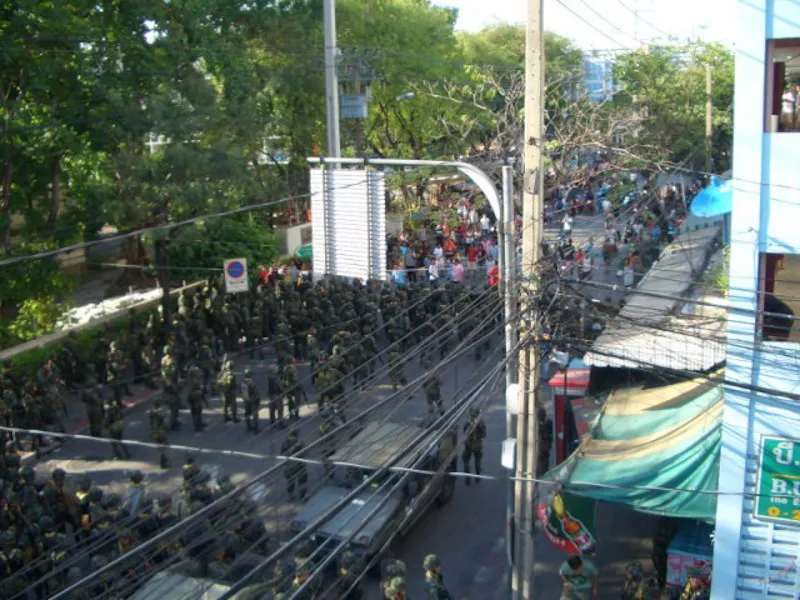 Protesters clash with riot police and military