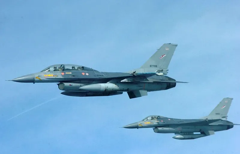 Two Royal Thai Air Force F-16 aircraft fly in formation