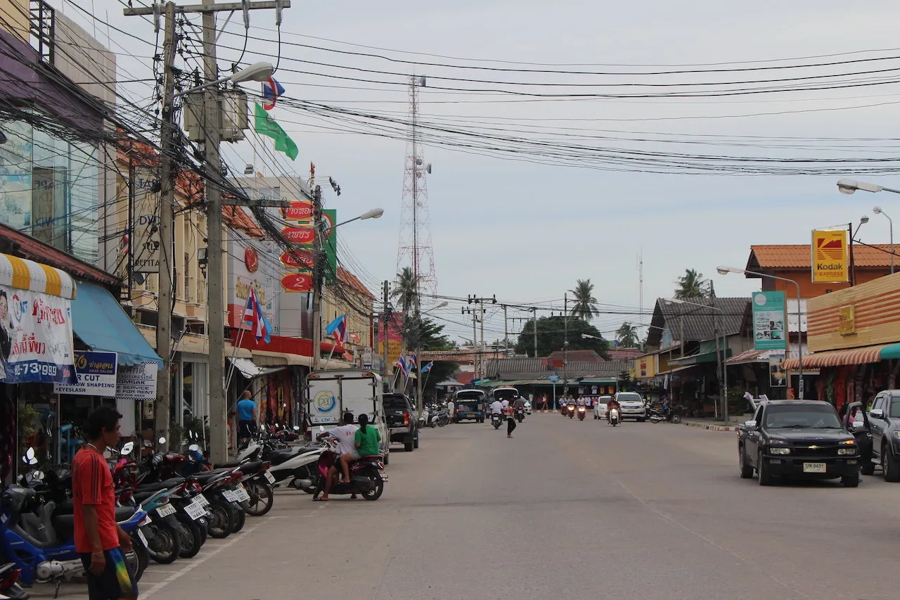 Motorcycles parked on a street in Koh Phangan.