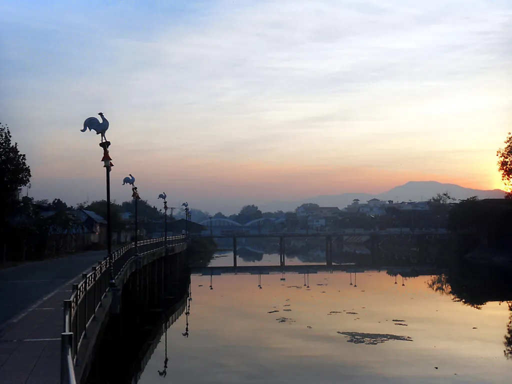 Sunset over a river in Lampang