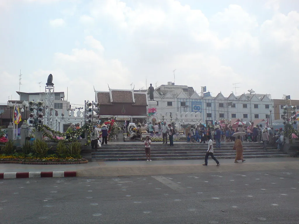 The statue of Thao Suranaree (Ya Mo). and the Chomphon Gate in the background in Korat