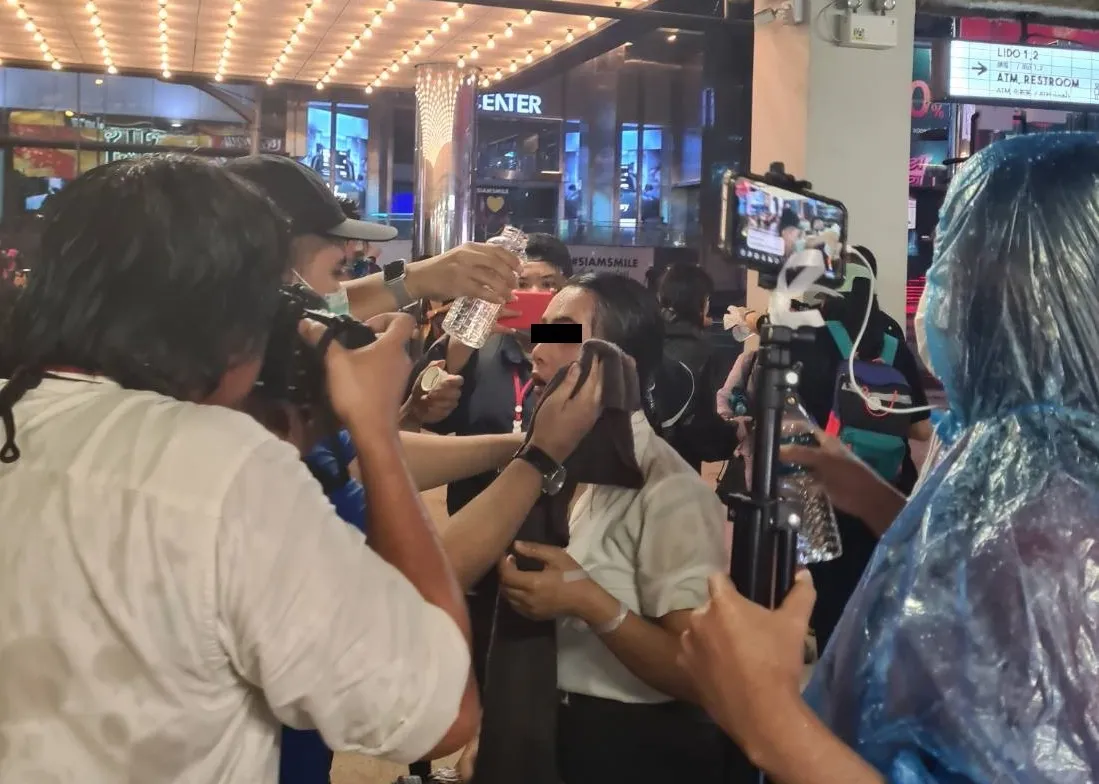 Student protester hit by tear gas on 16 October protest at Ratchaprasong Intersection, Bangkok