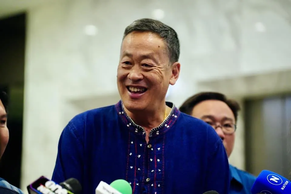 Thai Prime Minister Srettha Thavisin talking to reporters.