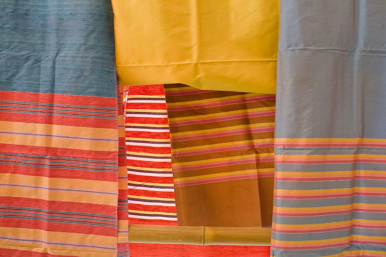 Colorful Thai fabrics. Textile clothes in Thailand.