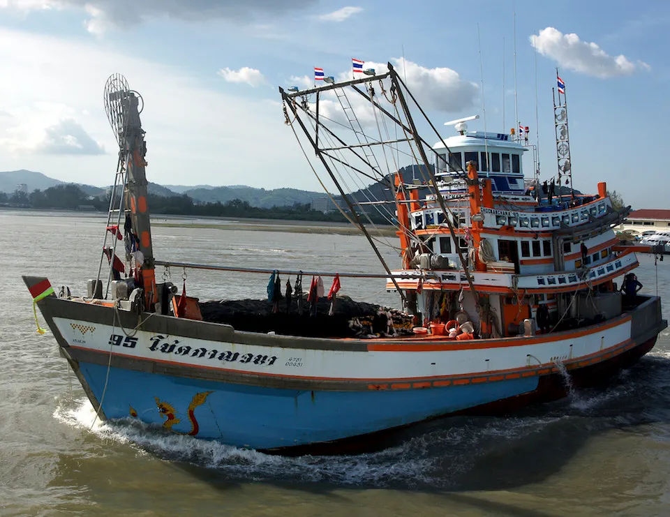 Thai fishing boat leaving Phuket harbour