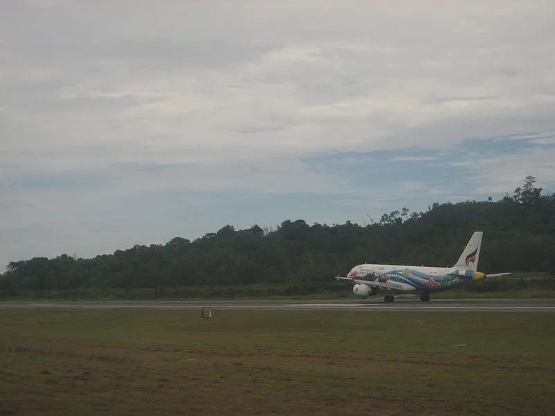 Aircraft taking off at Phuket international airport runway