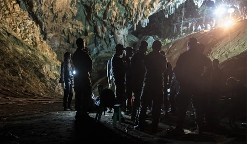 Airmen visit Tham Luang Cave in northern Thailand to meet with Royal Thai military officials and authorities