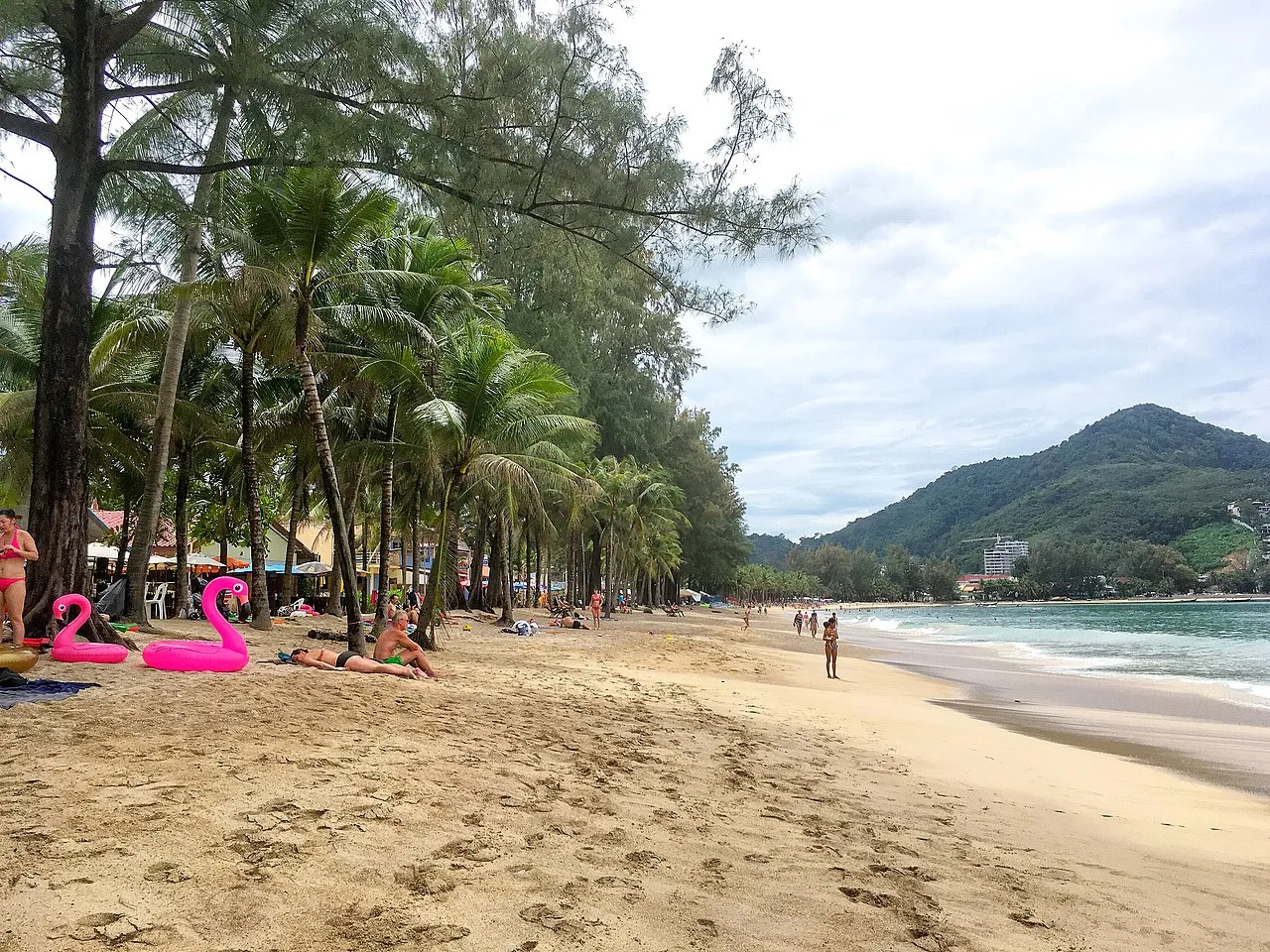 Tourists on Kamala Beach in Phuket.