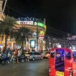 Taxis and motorcycles in Patong, Kathu District, Phuket