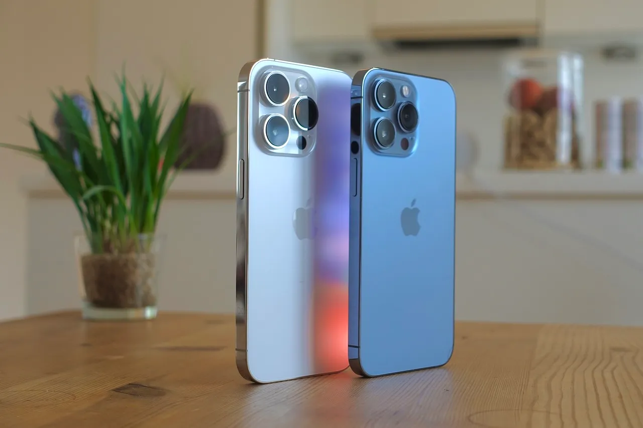 Two Apple iPhone 14 Pro smartphones