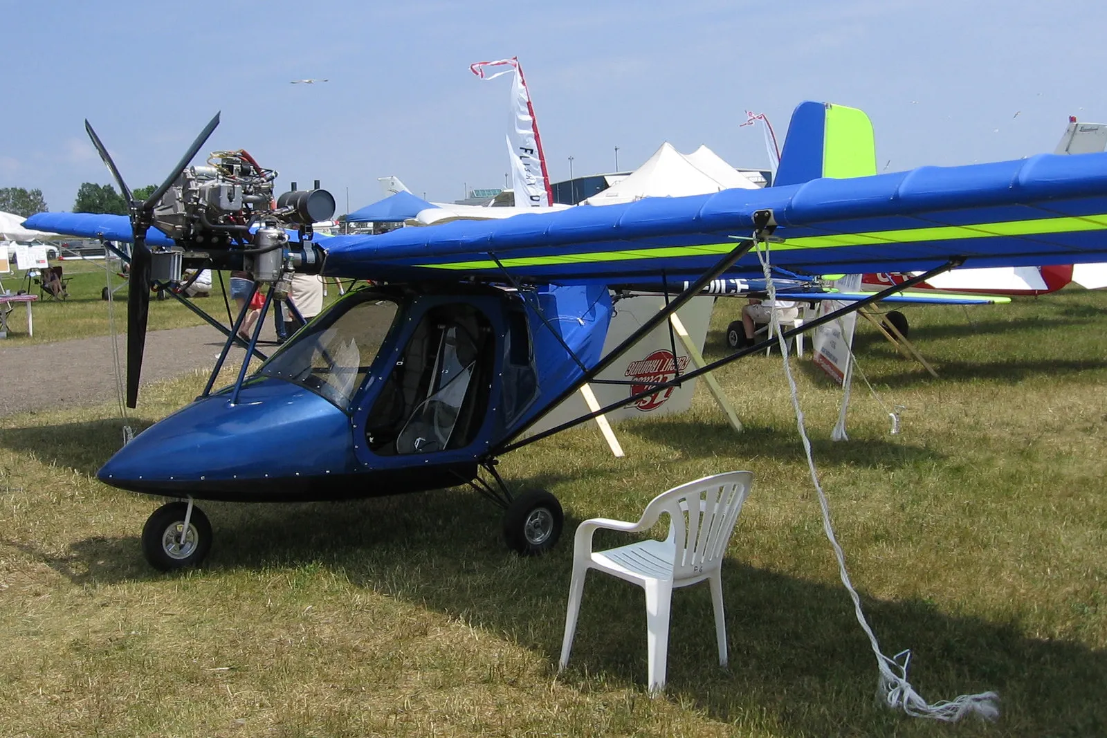 Blue ultralight plane.
