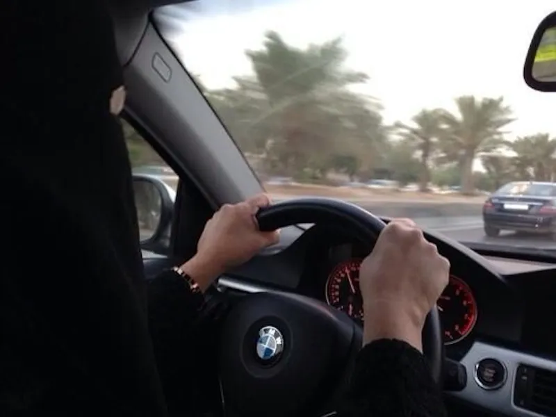 Saudi woman driving a BMW car