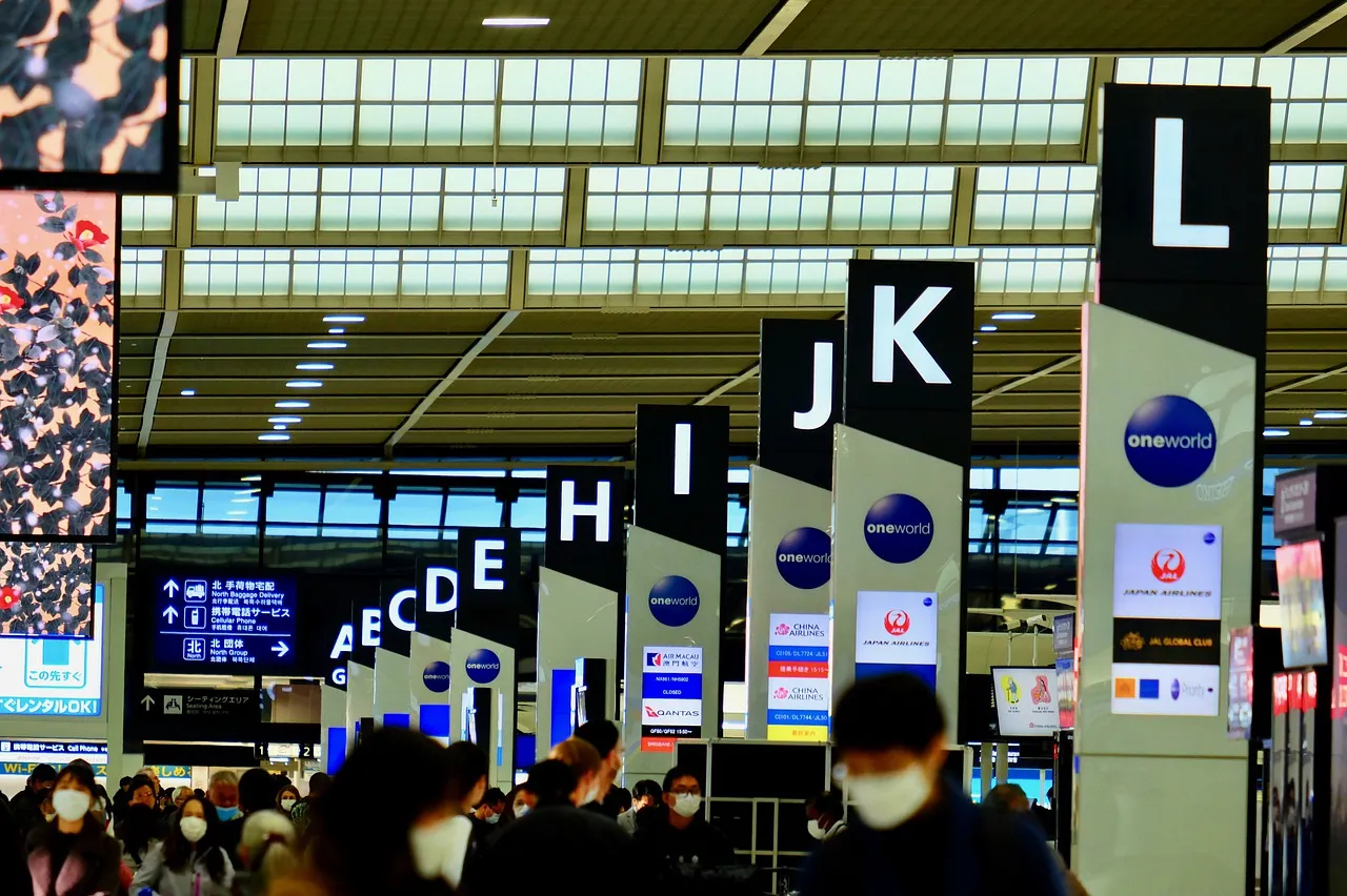 People wearing masks inside a airport terminal in China during the COVID-19 coronavirus outbreak