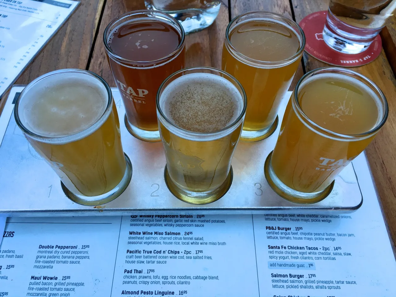 Beer glasses and menu in a restaurant