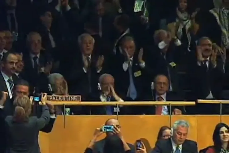 UN delegates applaud after United Nations General Assembly resolution