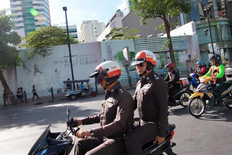 Police officers riding a motorcycle