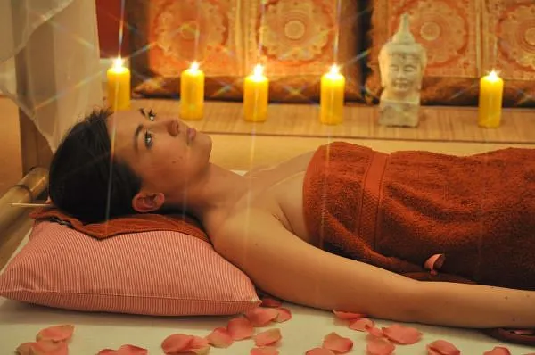 Woman getting Thai massage.